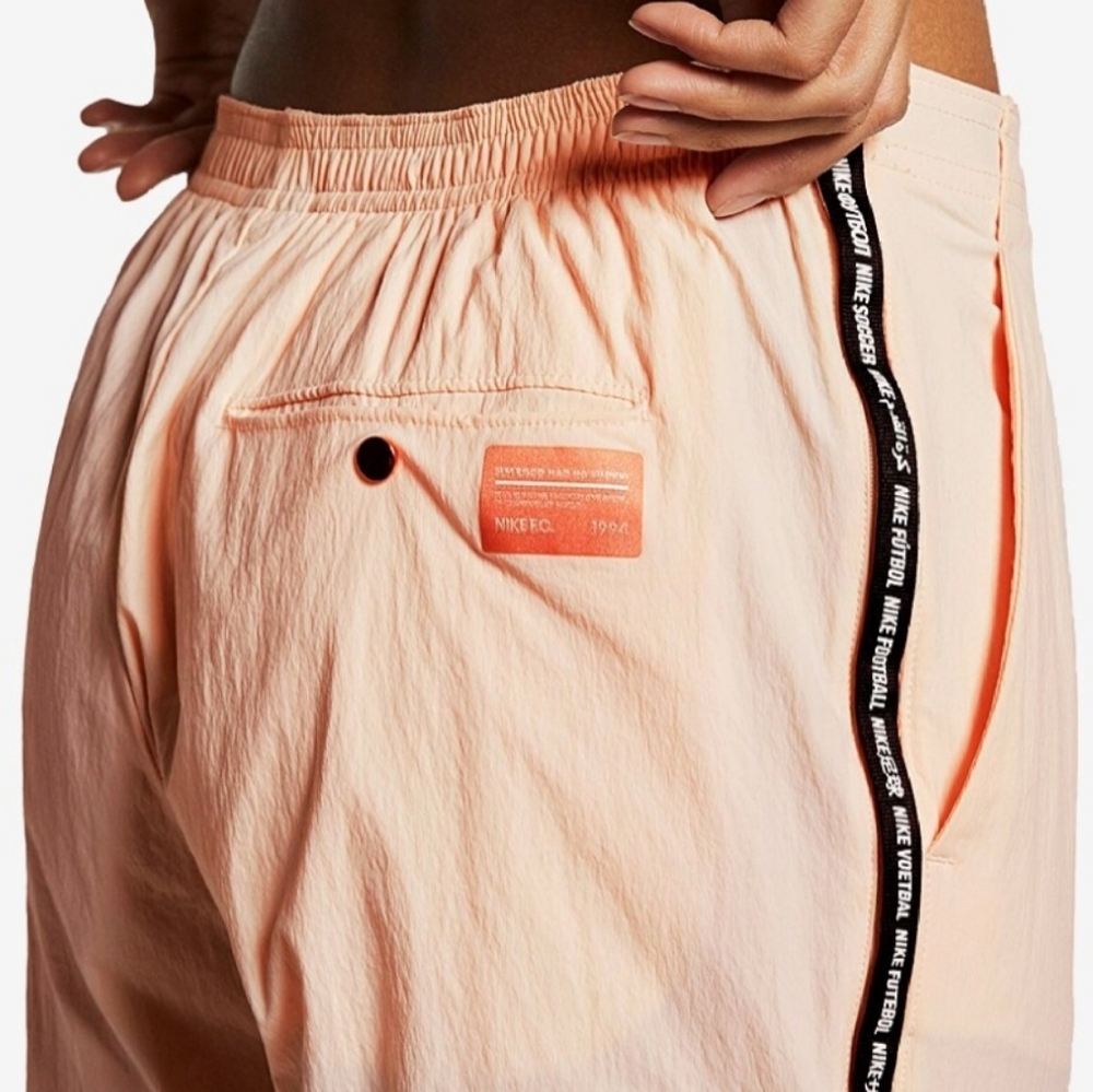 Nike Women's Peach Track Pants with Black Side Tape - Picture 5 of 9